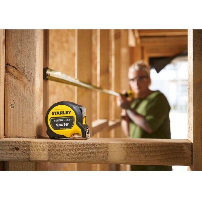 Рулетка вимірювальна CONTROL-LOCK довжиною 5 м/16, шириною 25 мм, в обгумованому корпусі, з подвійною шкалою STANLEY STHT37235-5 (STHT37235-5)